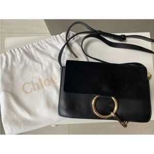 Chloe Black Crossbody Bag with Gold Ring Accent